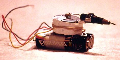 Tattoo gun made from a battery, a small motor, a sewing needle and a few wires.